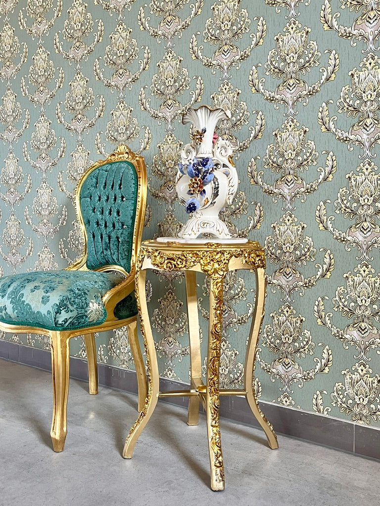 Small gold end table with beige marble top, featuring hand-carved gold gilded decor, perfect as a stylish accent furniture piece