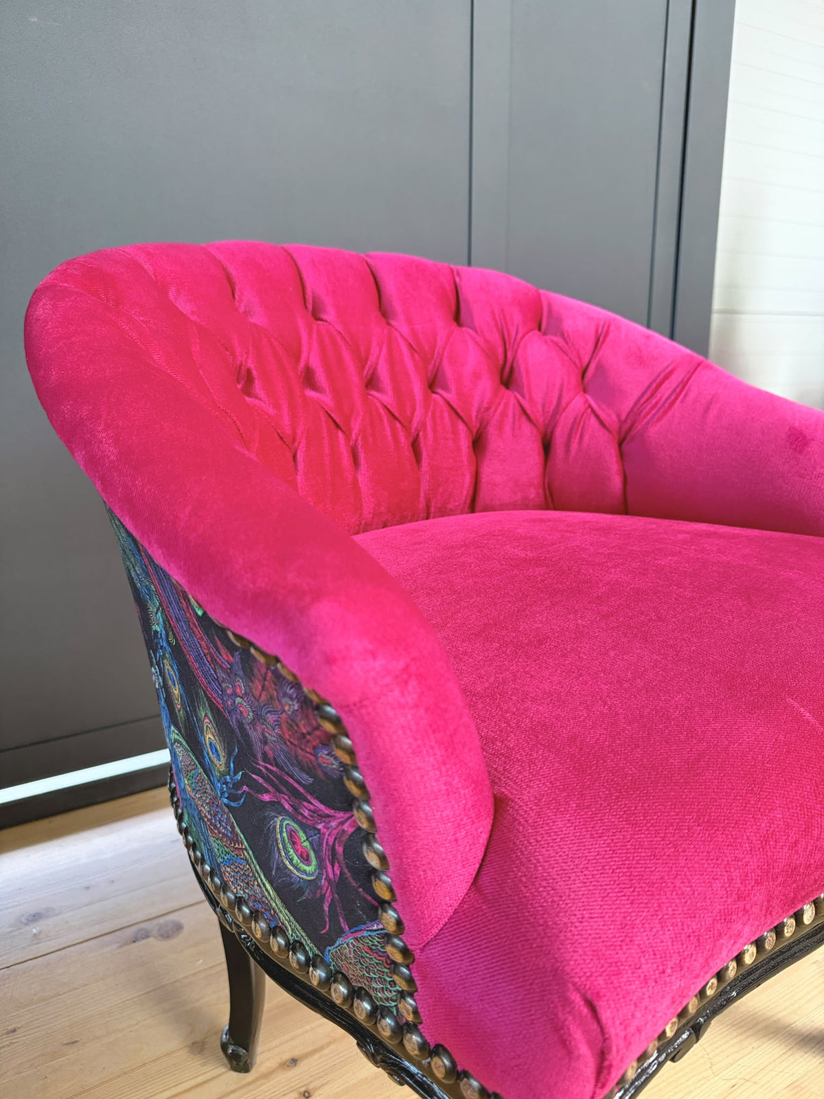 Fuchsia velvet French accent armchair with jungle print upholstery, tufted design, and glam lounge style by CasAmin Möbel.