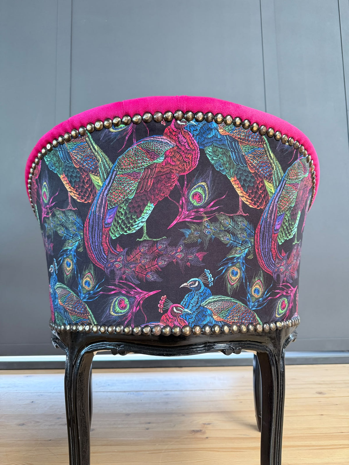 Fuchsia velvet cocktail lounge chair with jungle print and tufted French accent armchair by CasAmin Möbel, stylish and plush.